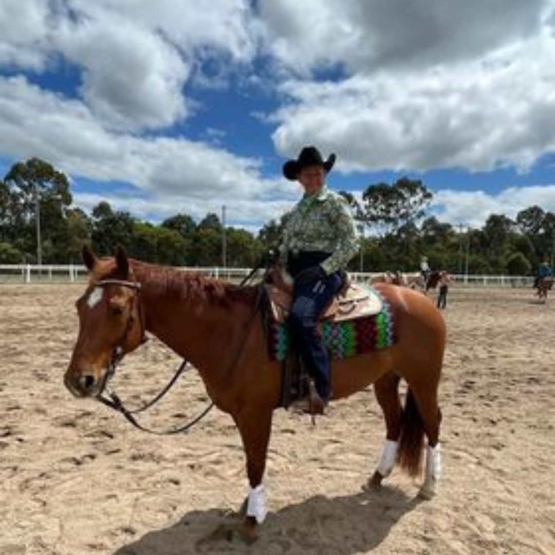 woman in ride proud show ring jeans