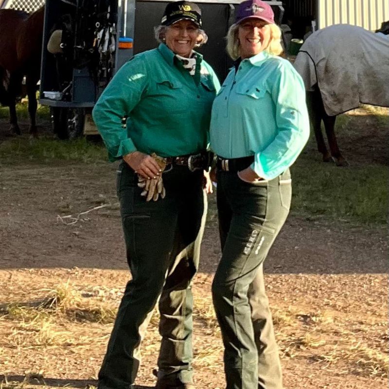 two woman standing wearing limited edition style pants ride proud