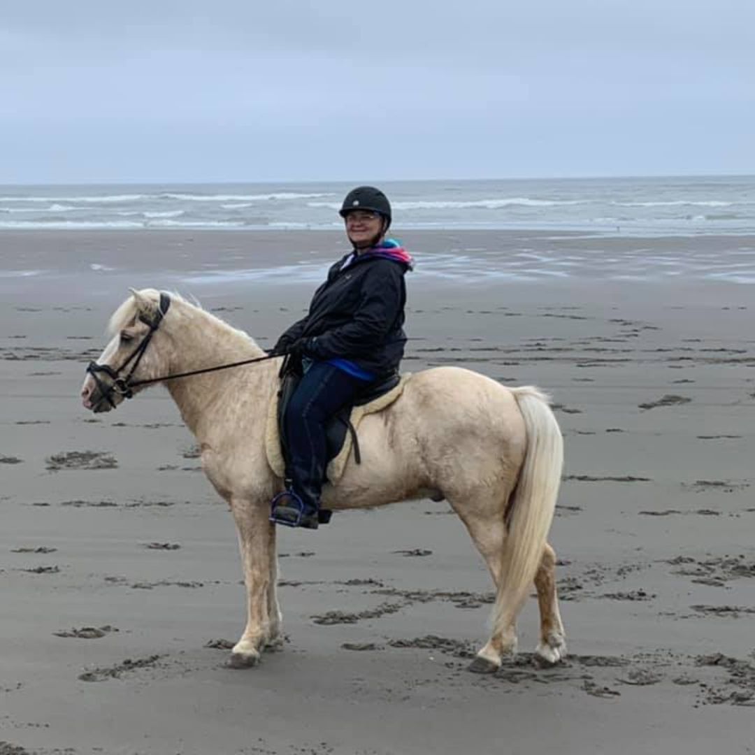 woman riding a horse wearing a ride proud new horizon jeans