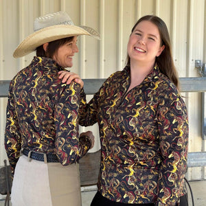 women in abstract horse riding shirt