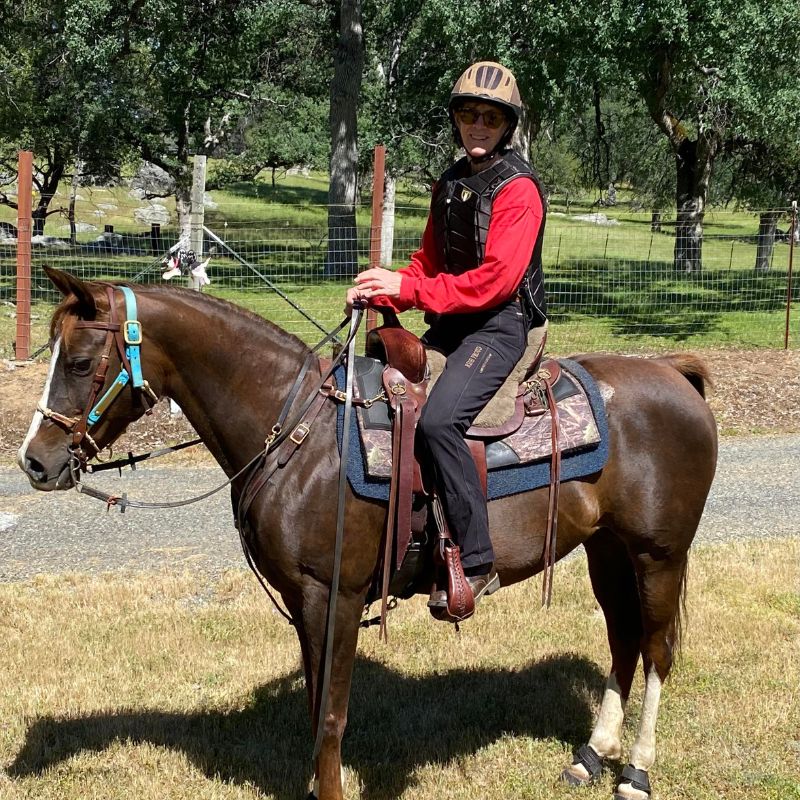 woman in a horse wearing ride proud limited edition pants