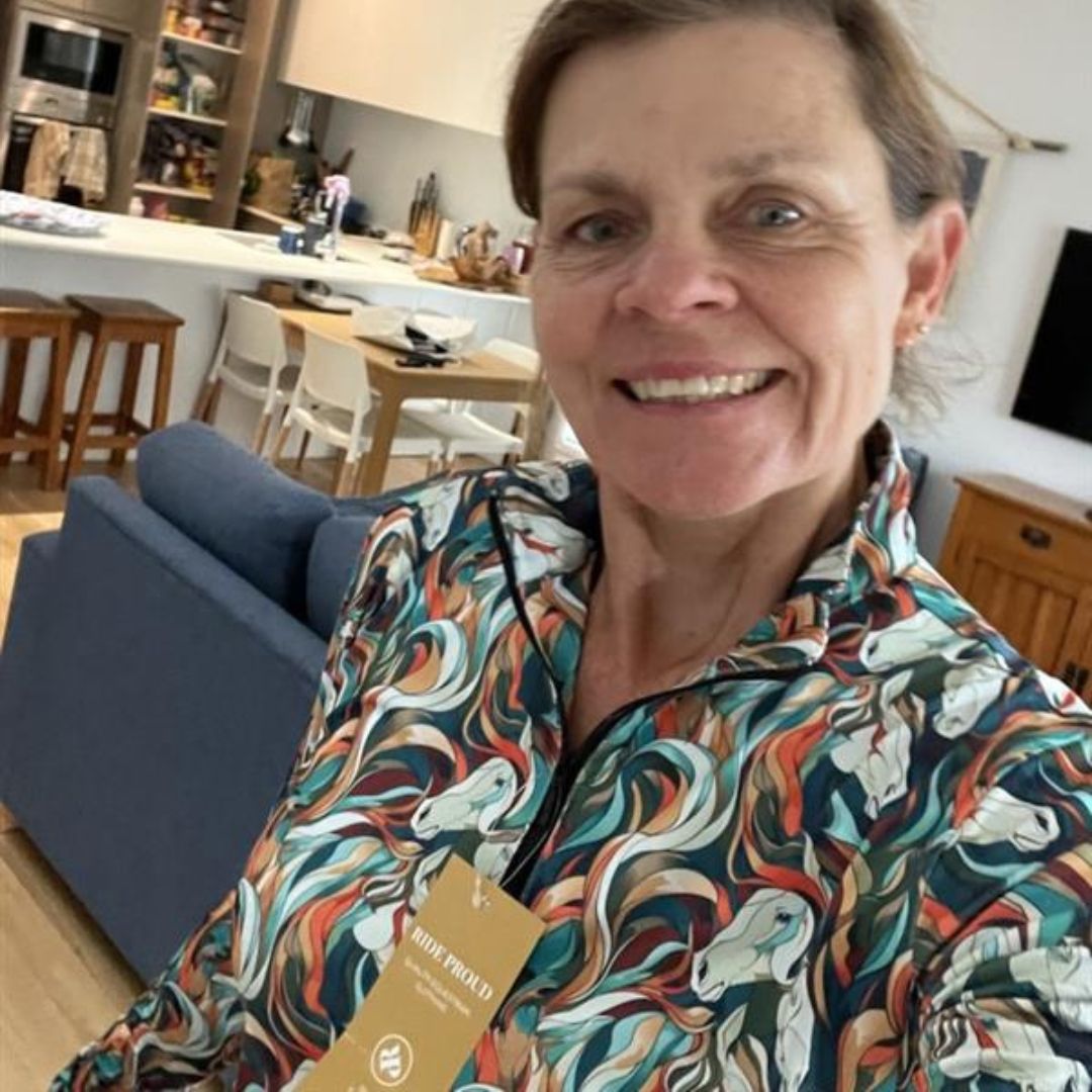 woman in horse riding shirt aurora print from ride proud clothing