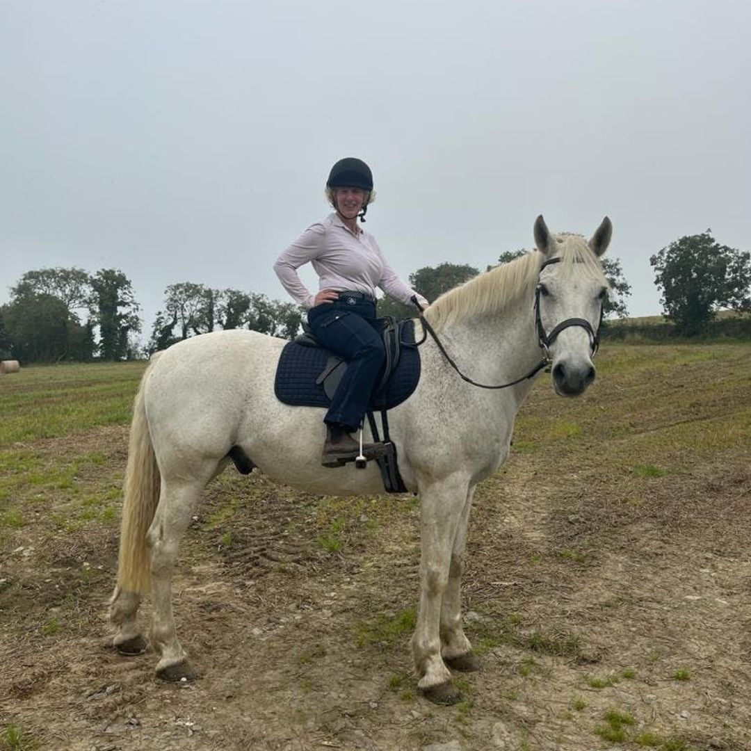 woman in ride proud horse riding pants stable horizon