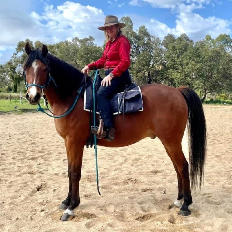 woman in ride proud horse riding pants trail