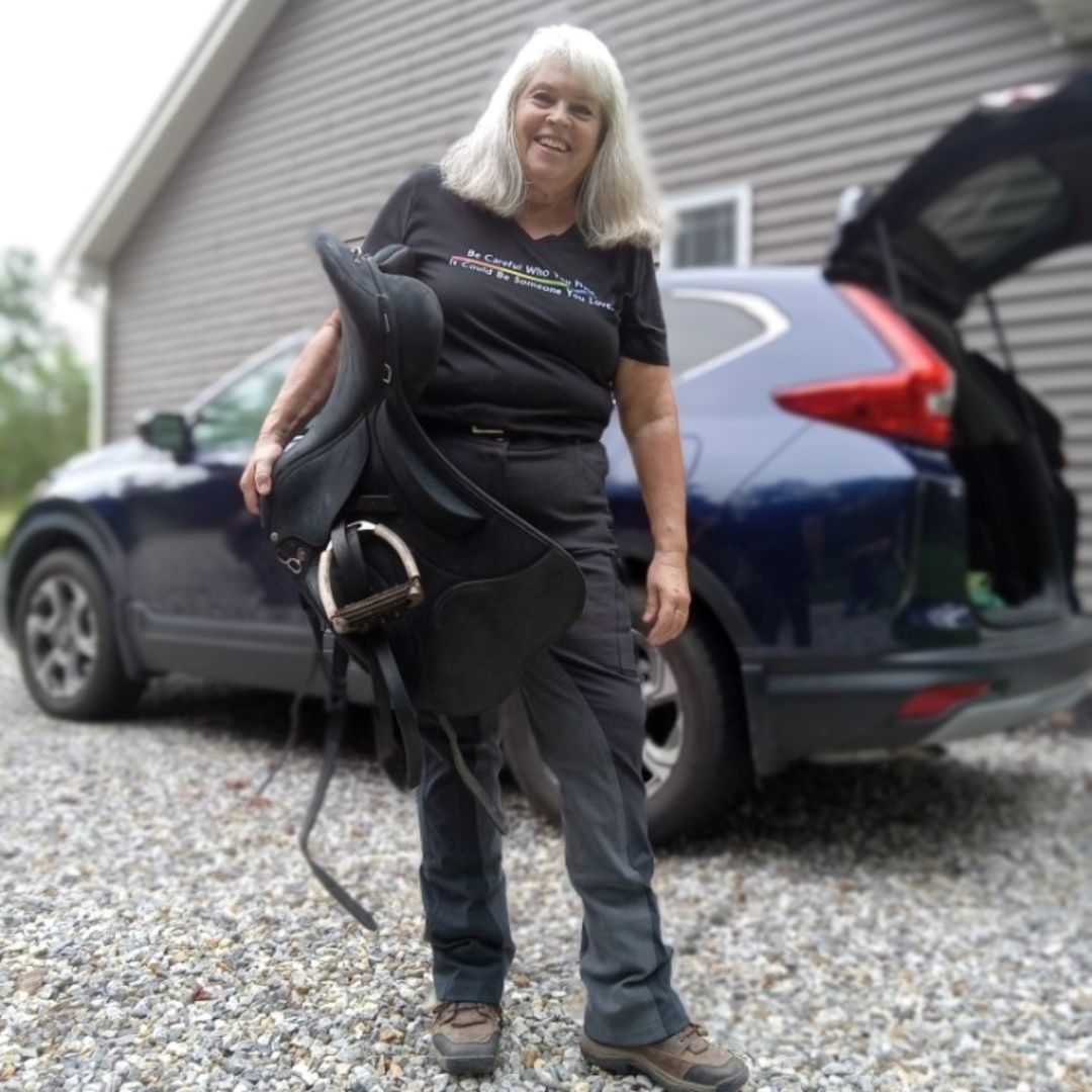 woman in ride proud horse riding pants in trainers