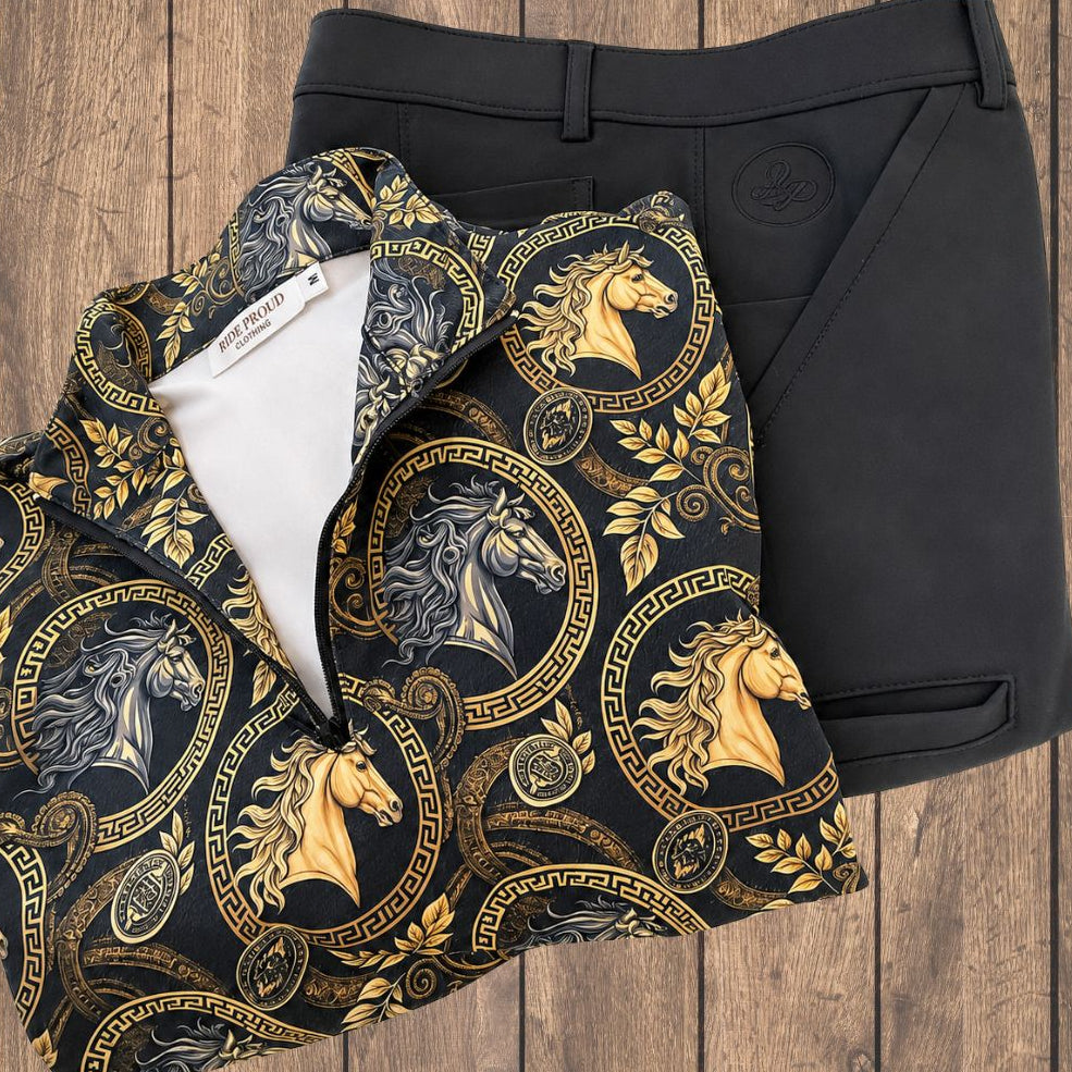 Patterned horse riding shirt with horse design on a wooden surface
