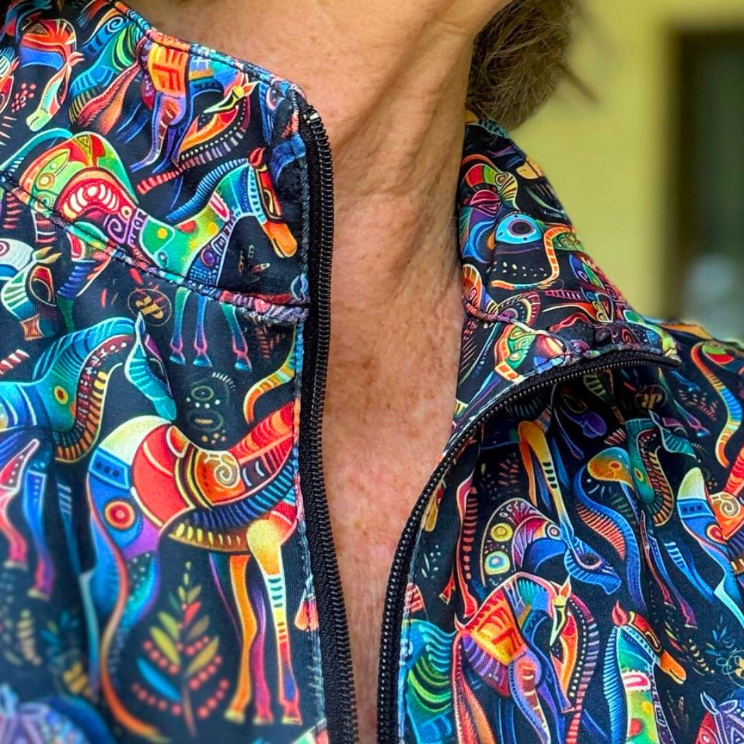 close up of the zipper style of the Ride Proud Kaleidoscope Riding Shirt 
