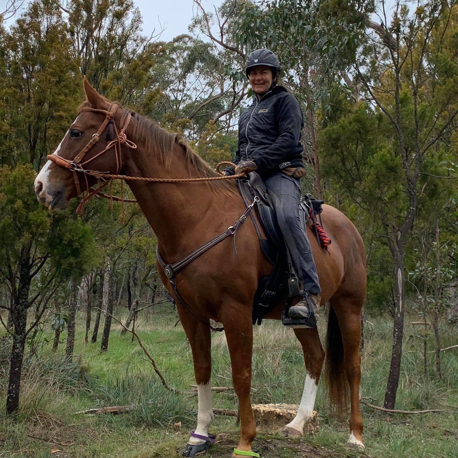 woman wearing Trainers Horse Riding Pants in the woods