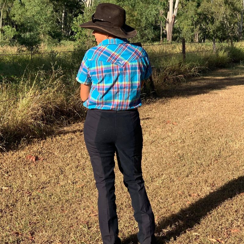 back view of a woman wearing stripes