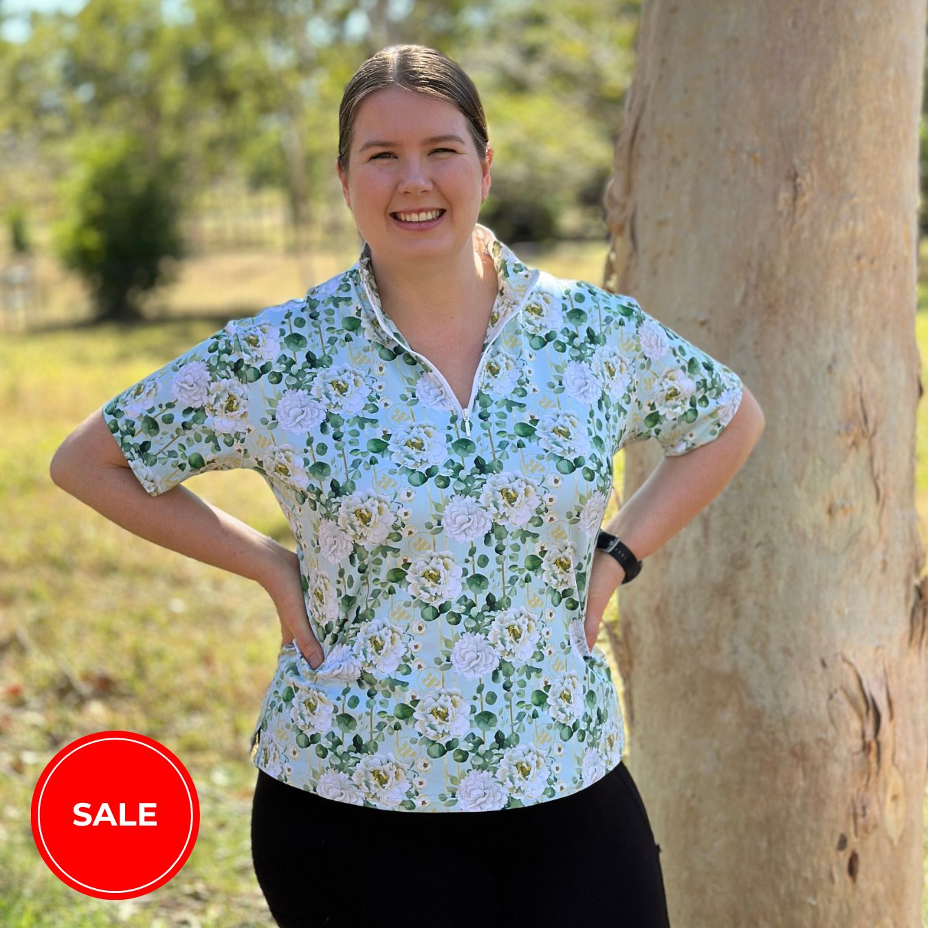 woman in horse riding shirt in peony print light short sleeve from ride proud clothing