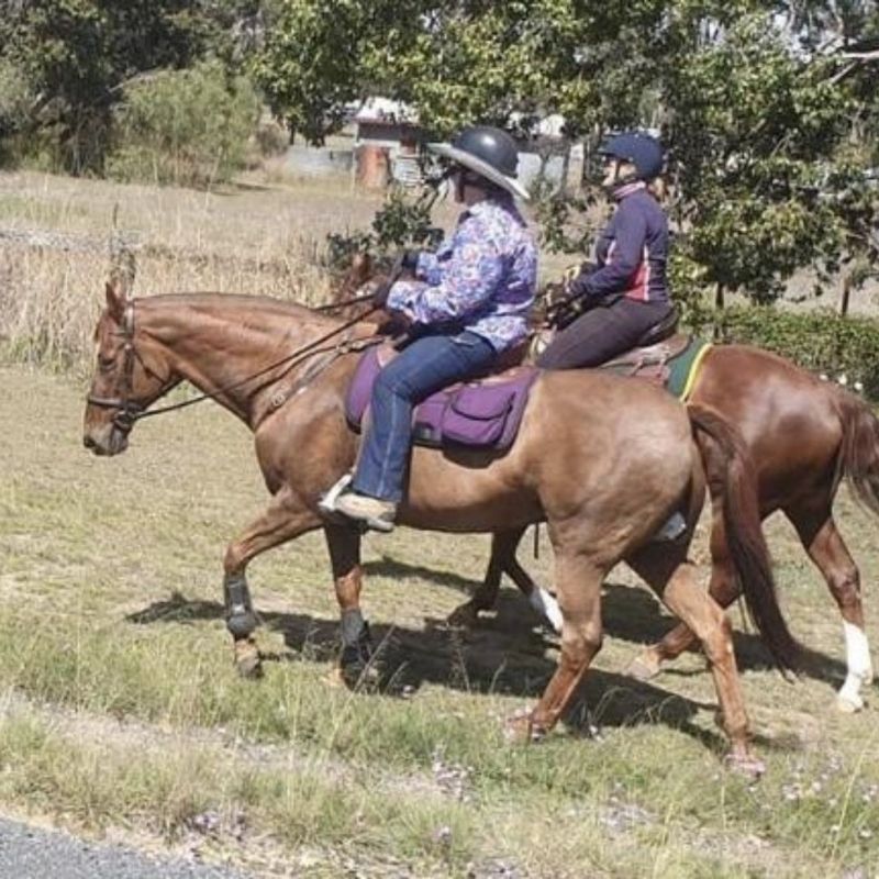 two women riding wearing horizon jeans