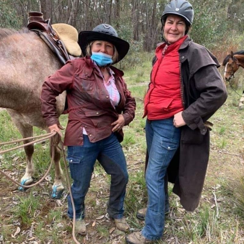 woamn in her horizon jeans smiling
