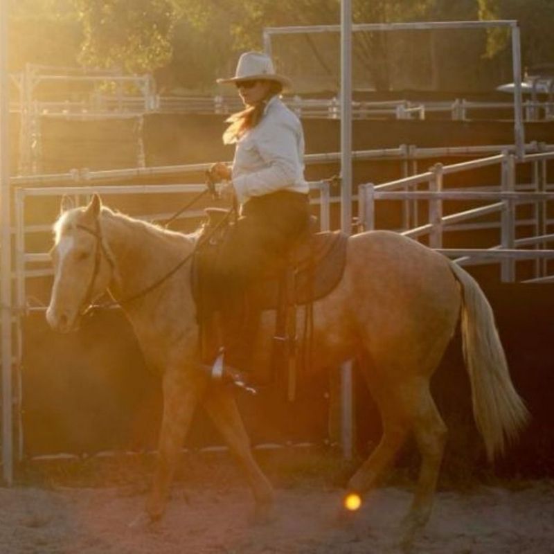 woman in equitation under the sun