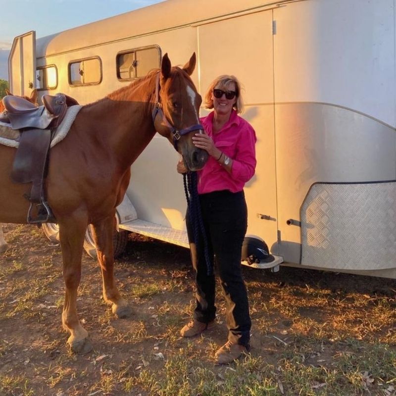 woman in equitation wearing wild pink long sleeves