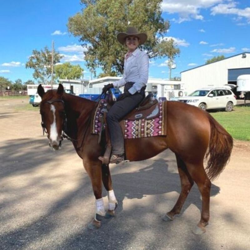 woman in equtation paired with white long sleeve