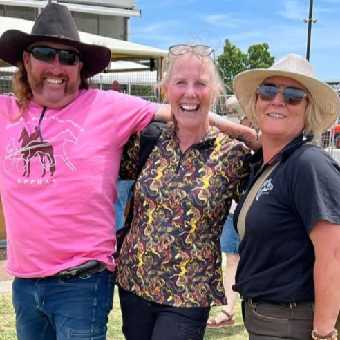 woman_in_ride_proud_riding_shirt_in_abstract_hore