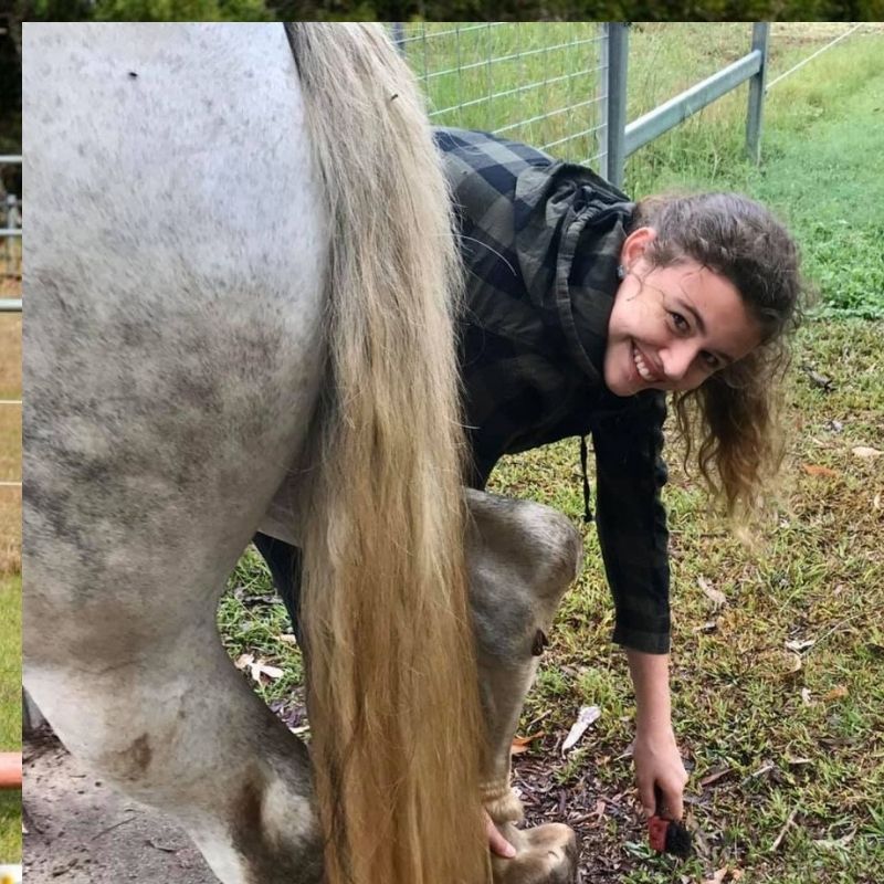 woman smiling wearing Trainers Horse Riding Pants