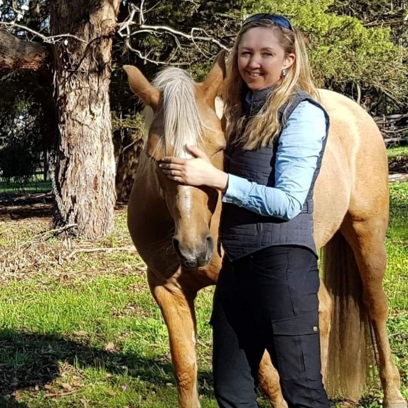 woman wearing black Trainers Horse Riding Pants
