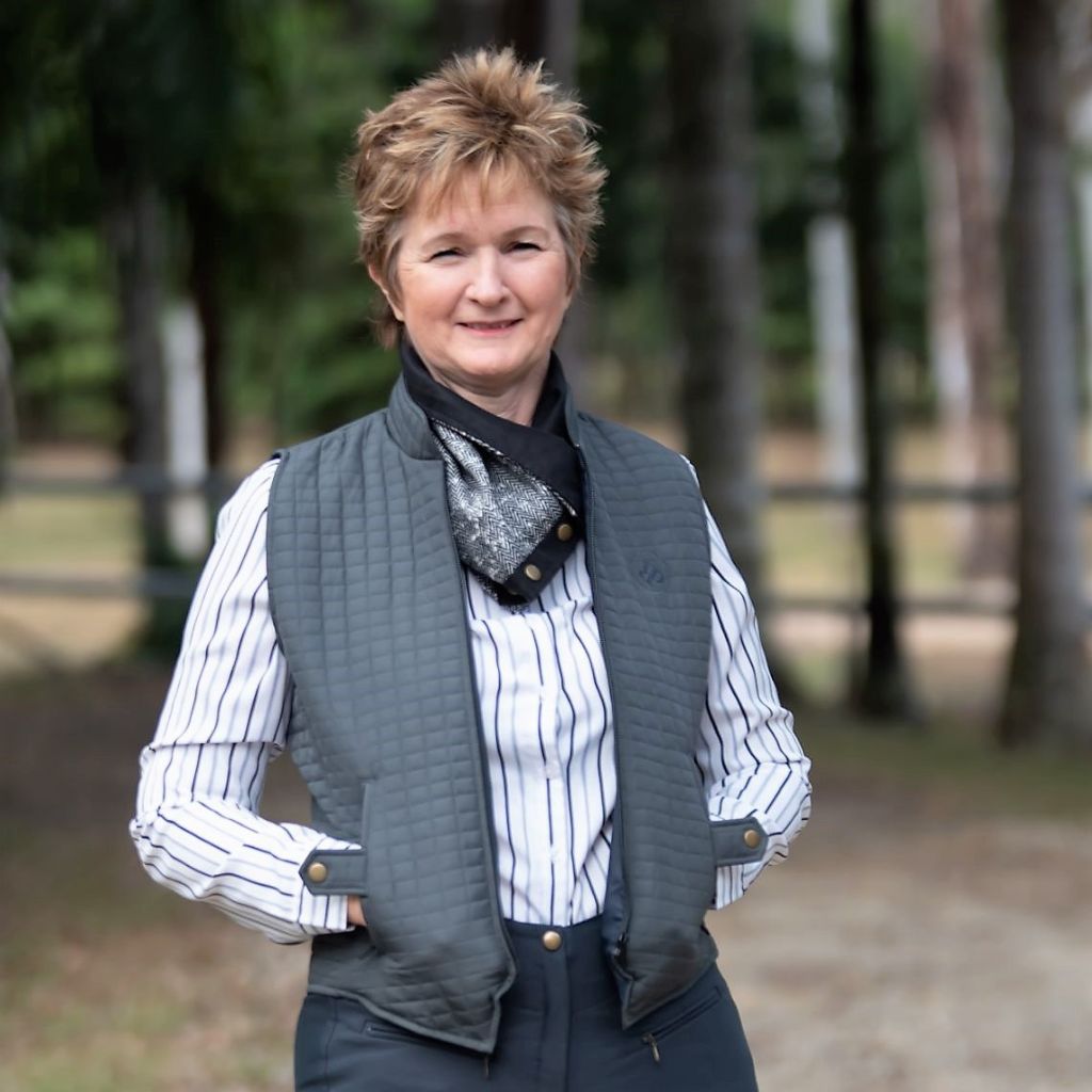 woman in ride proud riding vest black